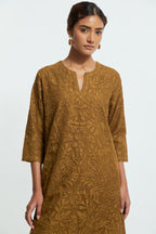 Olive silk organza straight kurta set featuring an all-over silk appliqué trellis jaal, delicately highlighted with subtle sequins.