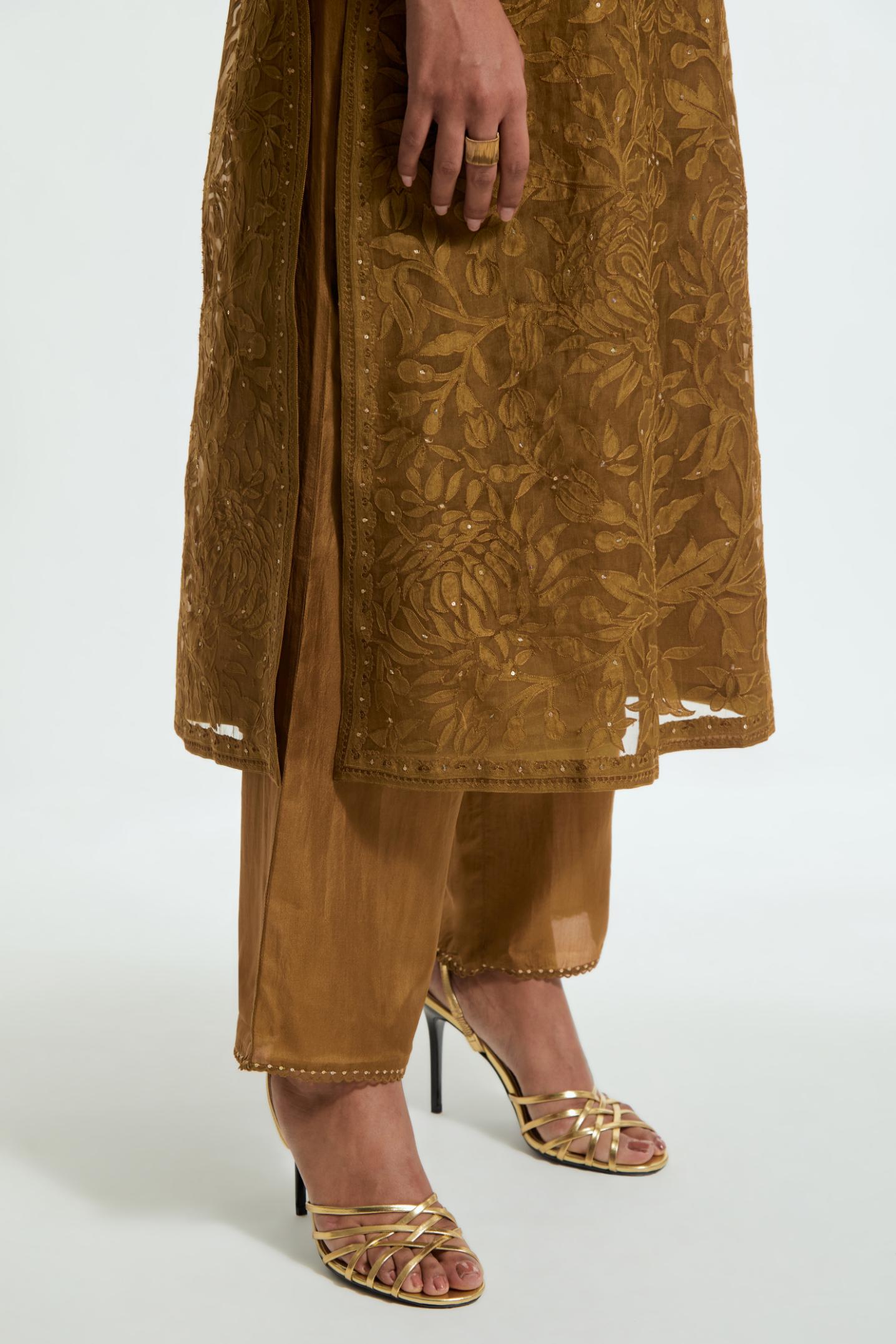 Olive silk organza straight kurta set featuring an all-over silk appliqué trellis jaal, delicately highlighted with subtle sequins.