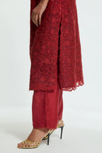 Red silk organza straight kurta set featuring an all-over silk appliqué trellis jaal, delicately highlighted with subtle sequins.