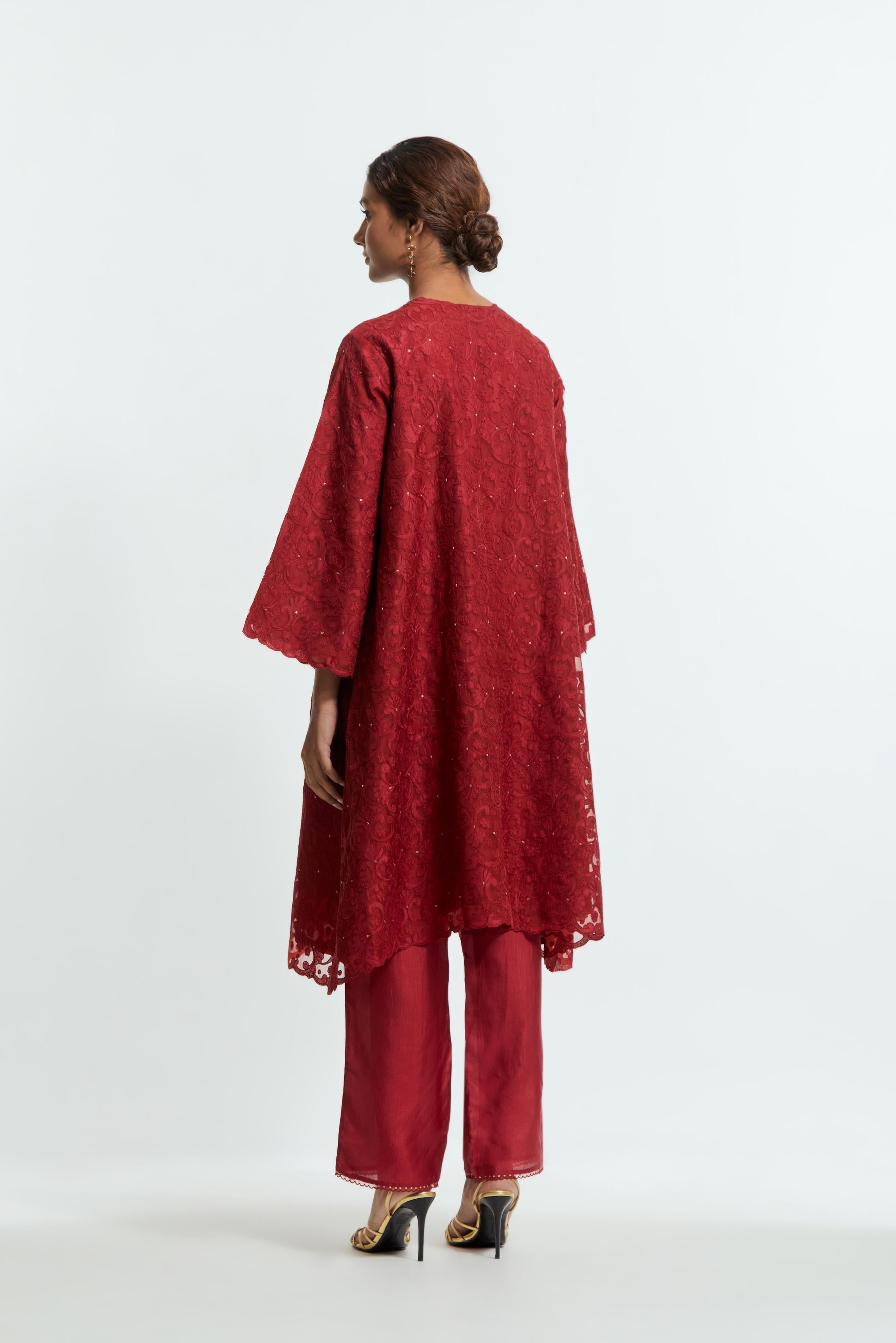 Red silk organza easy-fit short kurta set with a straight hem, featuring an all-over trellis jaal appliqué, delicately highlighted with subtle sequins.