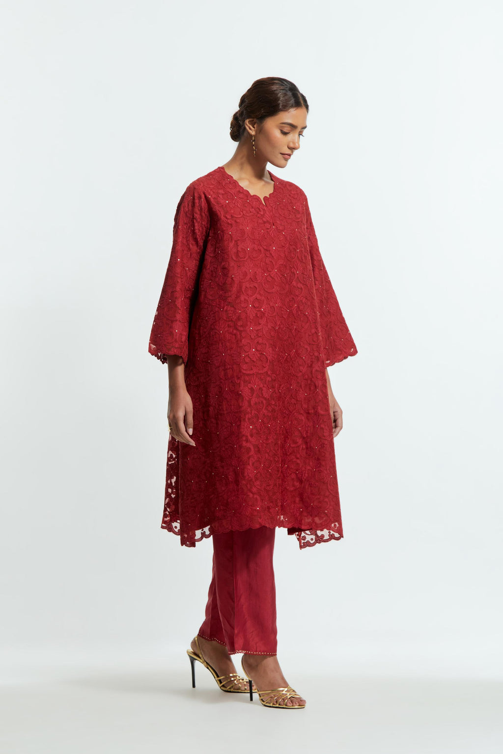 Red silk organza easy-fit short kurta set with a straight hem, featuring an all-over trellis jaal appliqué, delicately highlighted with subtle sequins.