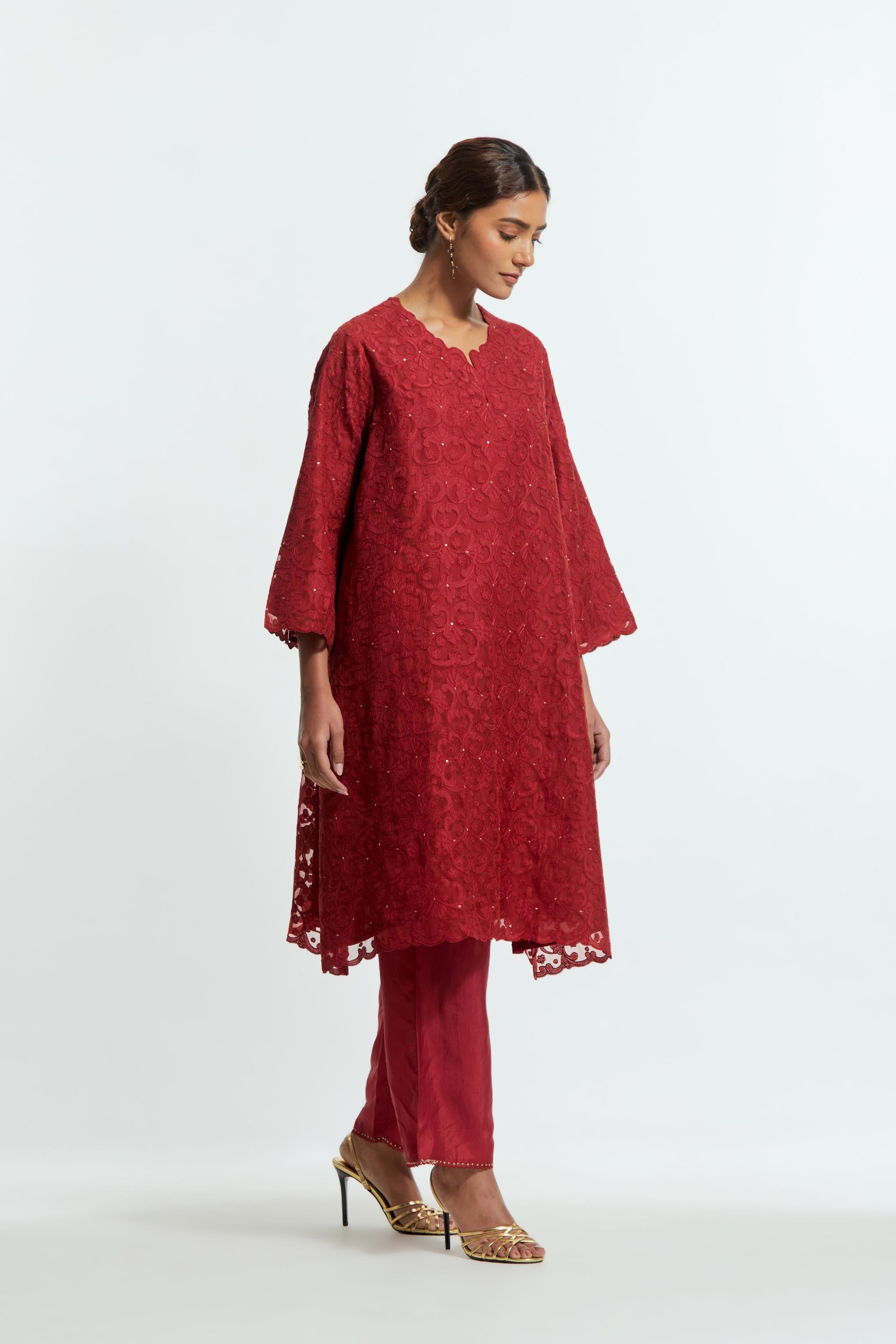 Red silk organza easy-fit short kurta set with a straight hem, featuring an all-over trellis jaal appliqué, delicately highlighted with subtle sequins.