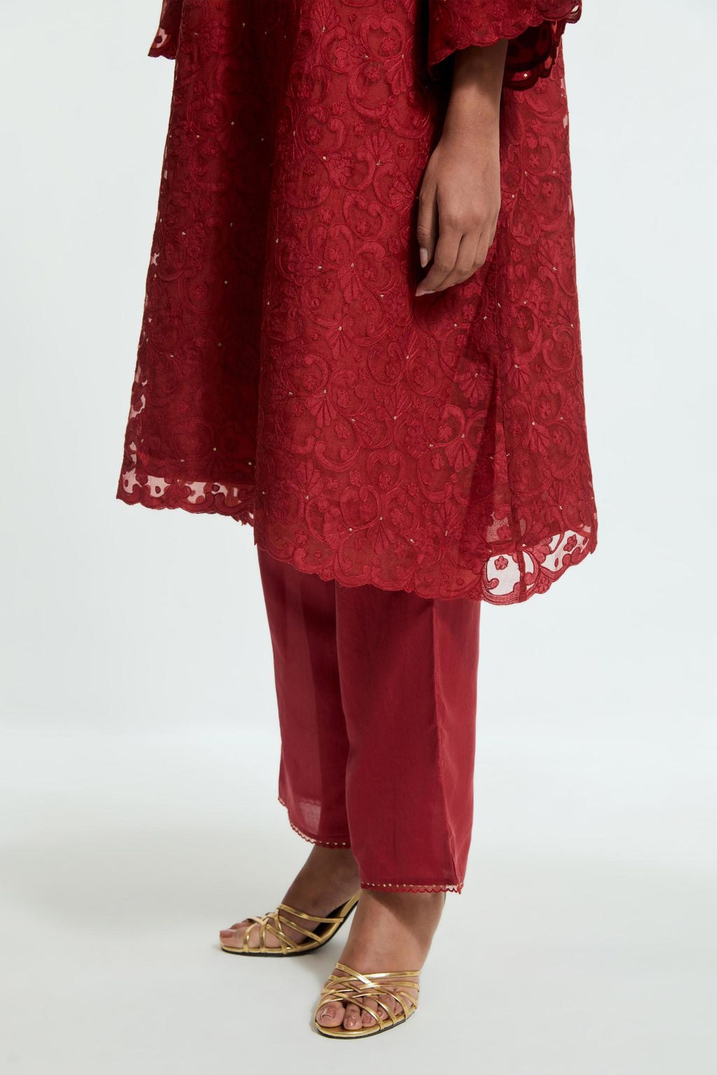 Red silk organza easy-fit short kurta set with a straight hem, featuring an all-over trellis jaal appliqué, delicately highlighted with subtle sequins.