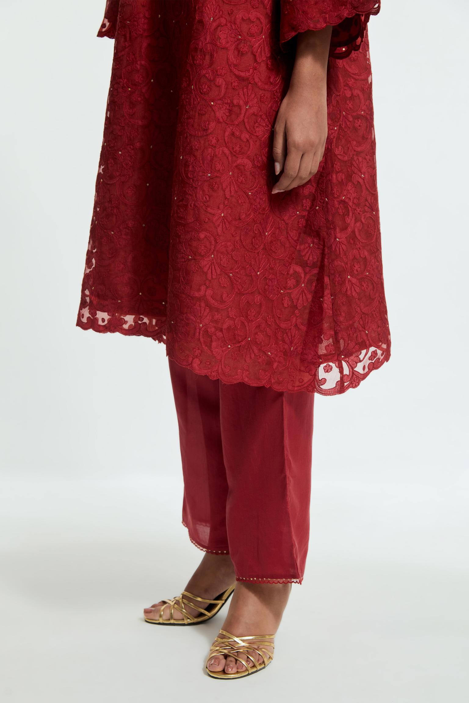 Red silk organza easy-fit short kurta set with a straight hem, featuring an all-over trellis jaal appliqué, delicately highlighted with subtle sequins.
