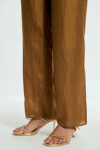 Olive silk straight pants detailed with scalloped organza edging at the hem, delicately highlighted with gold sequins work.
