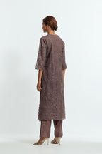 Grey silk organza straight kurta set featuring an all-over silk appliqué trellis jaal, delicately highlighted with subtle sequins.