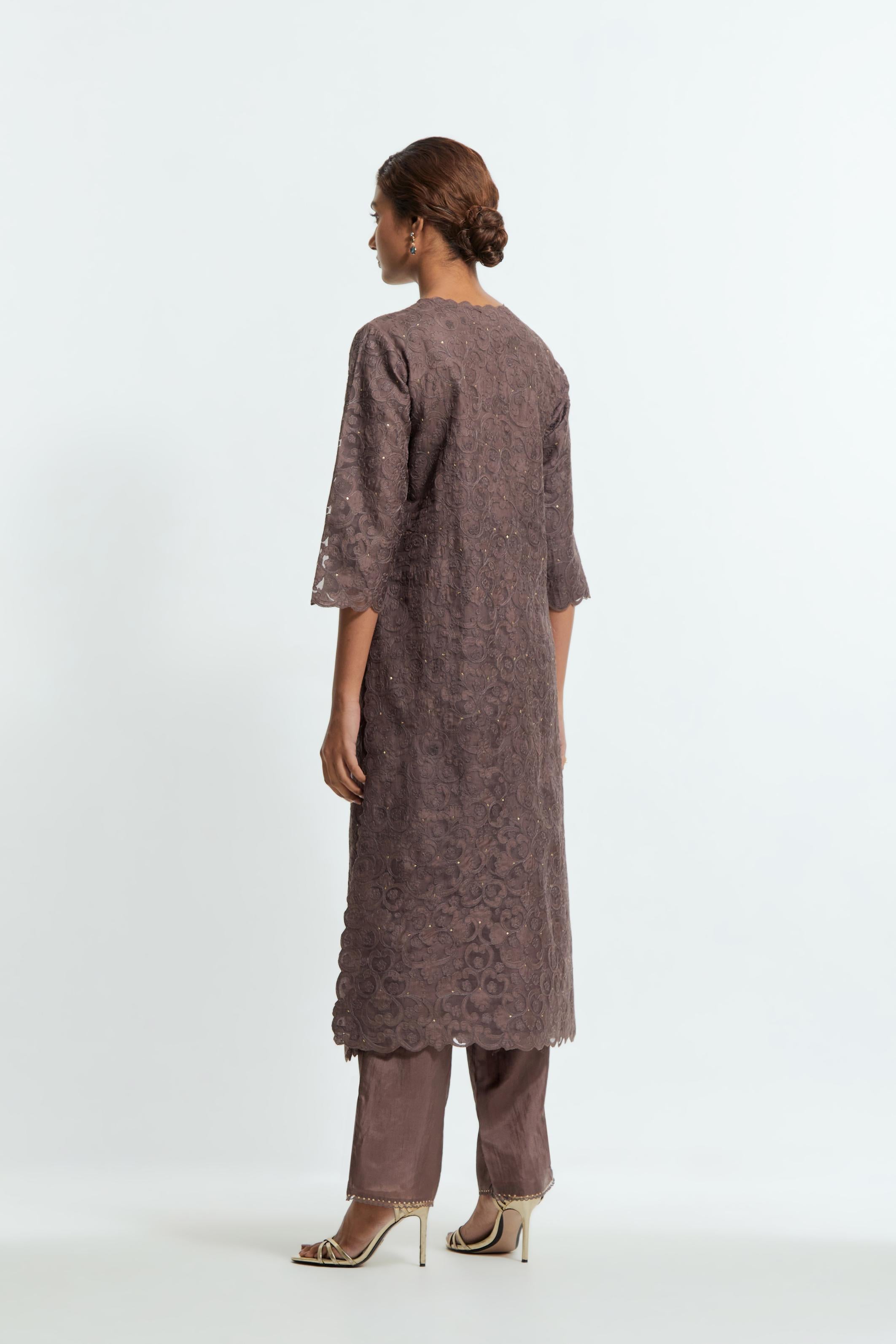 Grey silk organza straight kurta set featuring an all-over silk appliqué trellis jaal, delicately highlighted with subtle sequins.