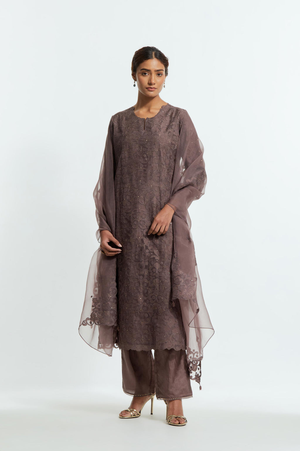 Grey silk organza straight kurta set featuring an all-over silk appliqué trellis jaal, delicately highlighted with subtle sequins.