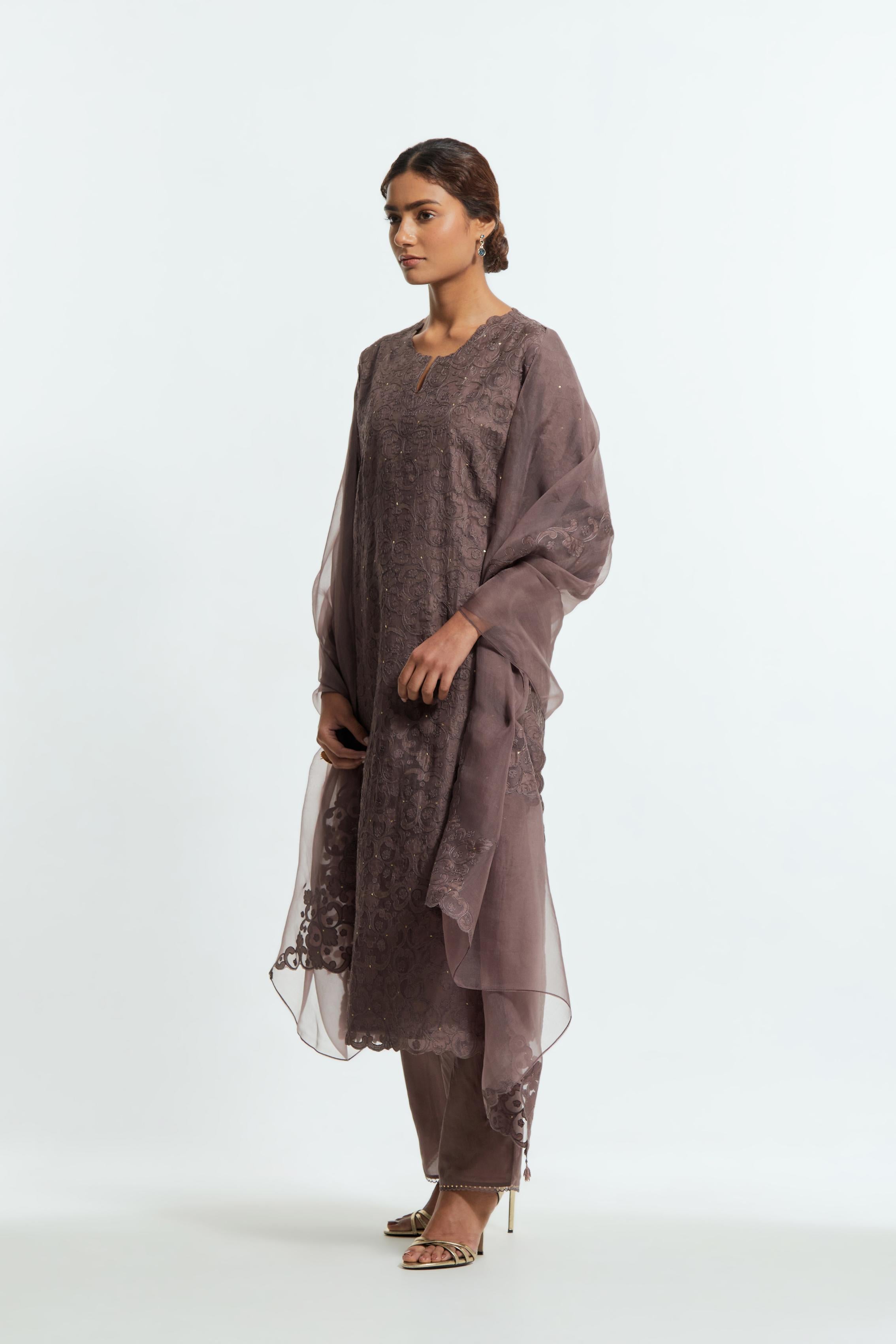 Grey silk organza dupatta featuring silk appliqué embroidery, delicately highlighted with subtle sequins.