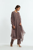 Grey silk organza straight kurta set featuring an all-over silk appliqué trellis jaal, delicately highlighted with subtle sequins.