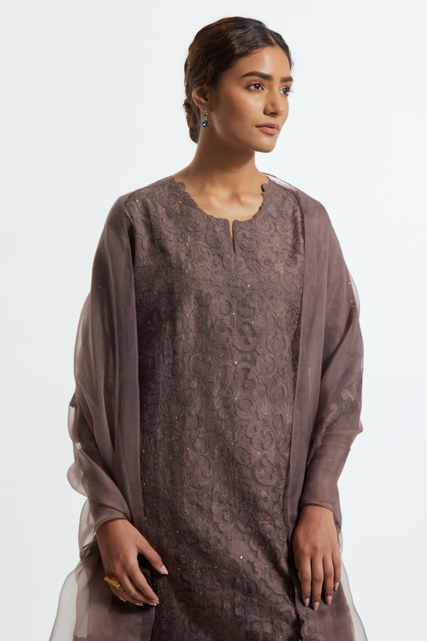 Grey silk organza dupatta featuring silk appliqué embroidery, delicately highlighted with subtle sequins.