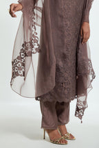 Grey silk organza straight kurta set featuring an all-over silk appliqué trellis jaal, delicately highlighted with subtle sequins.