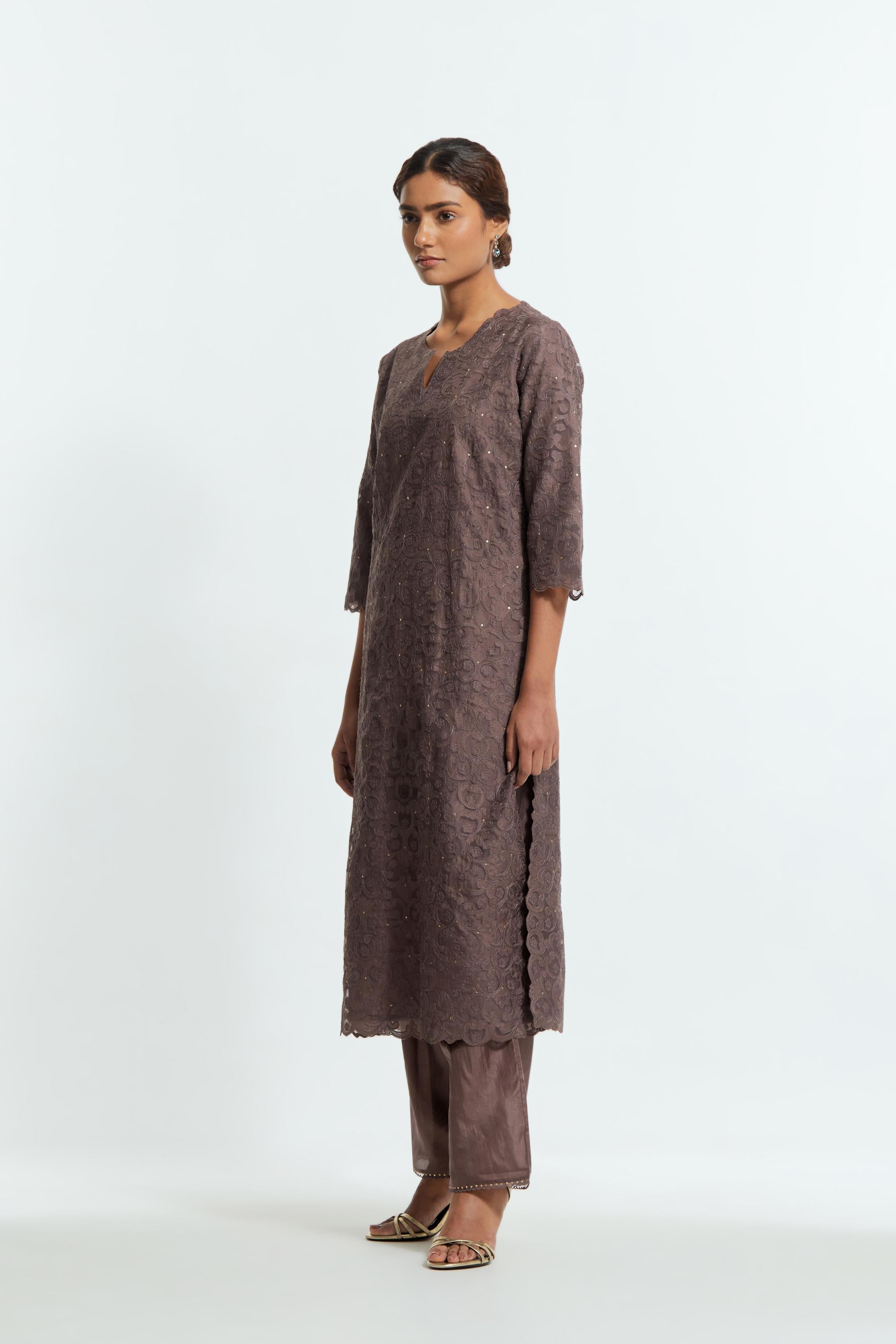 Grey silk organza straight kurta set featuring an all-over silk appliqué trellis jaal, delicately highlighted with subtle sequins.