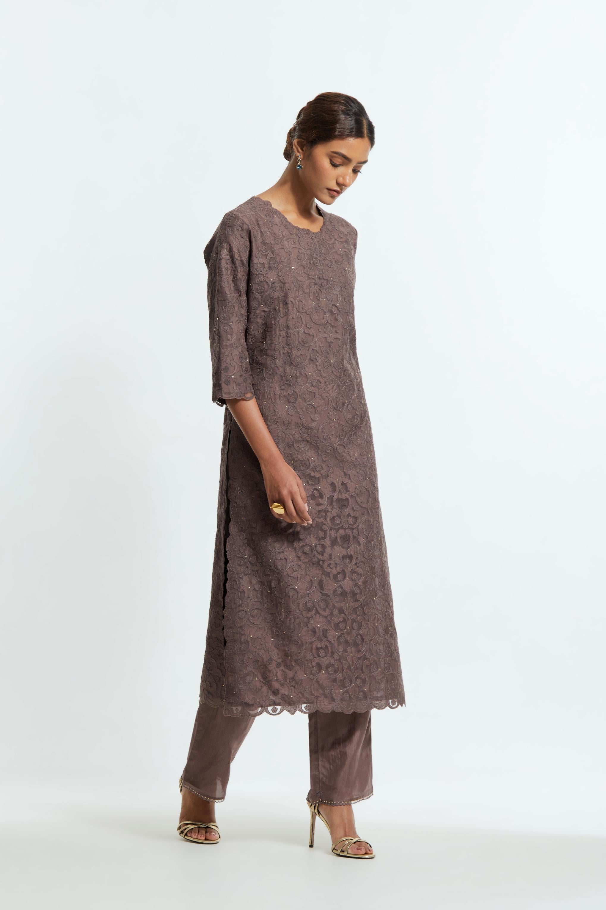 Grey silk organza straight kurta set featuring an all-over silk appliqué trellis jaal, delicately highlighted with subtle sequins.