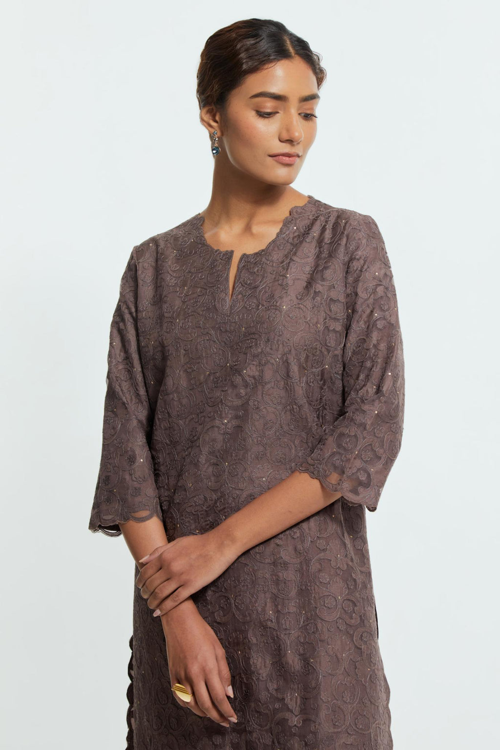 Grey silk organza straight kurta set featuring an all-over silk appliqué trellis jaal, delicately highlighted with subtle sequins.