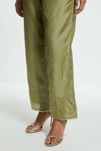 Green silk straight pants detailed with scalloped organza edging at the hem, delicately highlighted with gold sequins work.