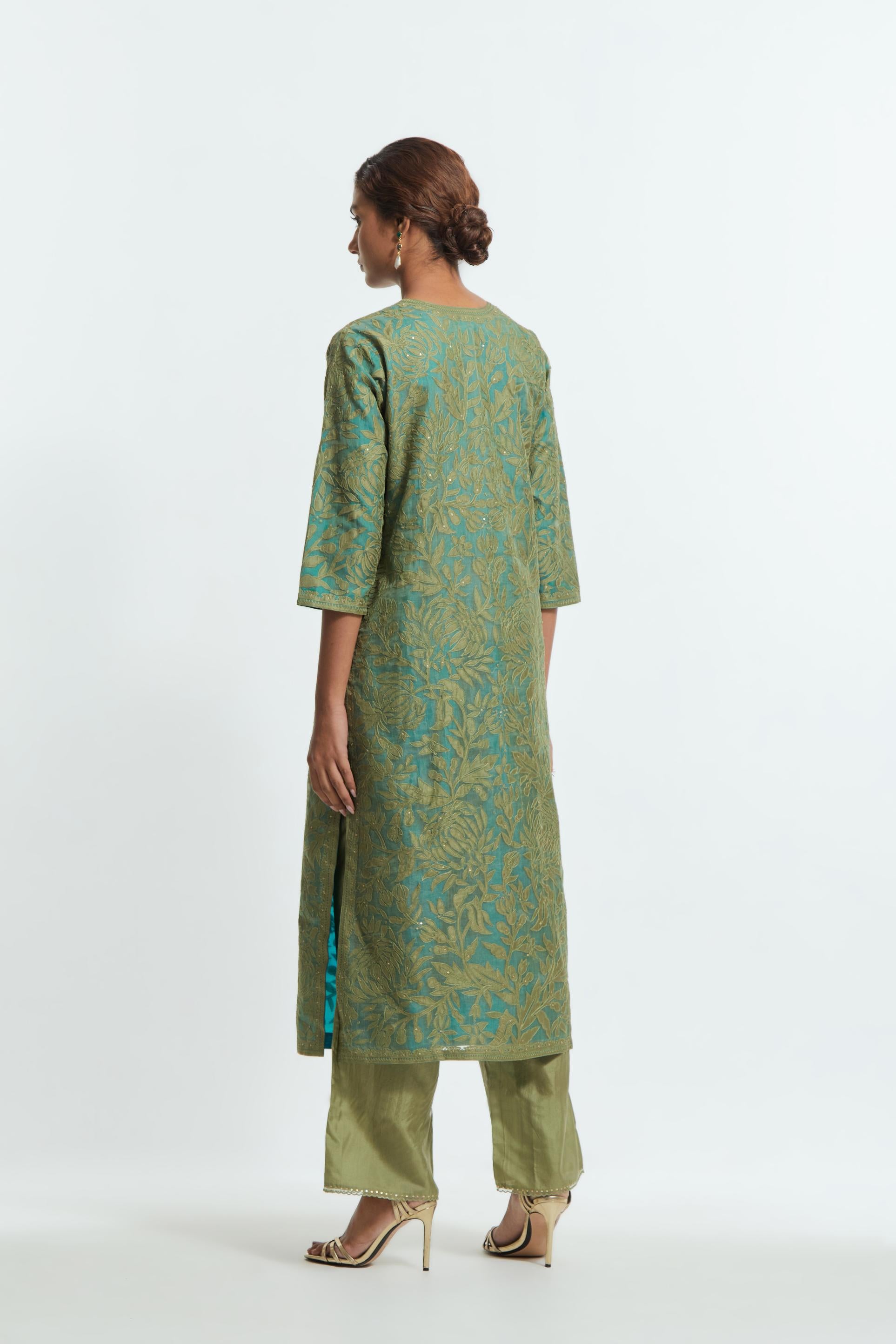 Green silk organza straight kurta set featuring an all-over silk appliqué trellis jaal, delicately highlighted with subtle sequins.