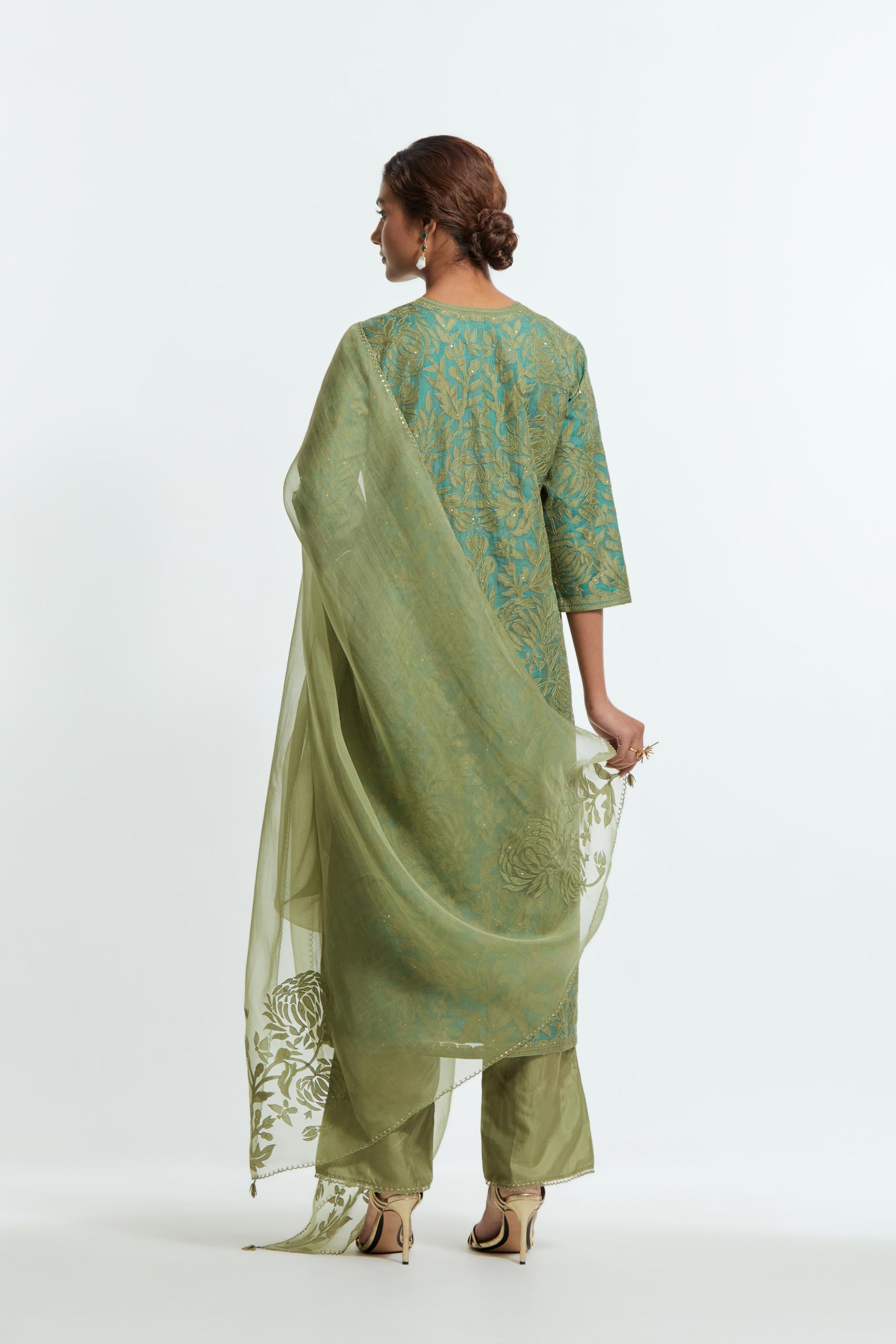 Green silk organza dupatta adorned with appliqué chrysanthemum floral motifs along all four borders, delicately highlighted with subtle sequins.
