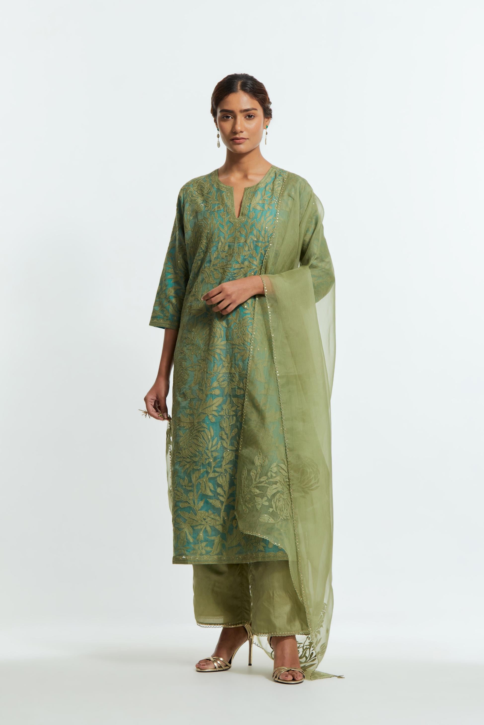 Green silk organza straight kurta set featuring an all-over silk appliqué trellis jaal, delicately highlighted with subtle sequins.