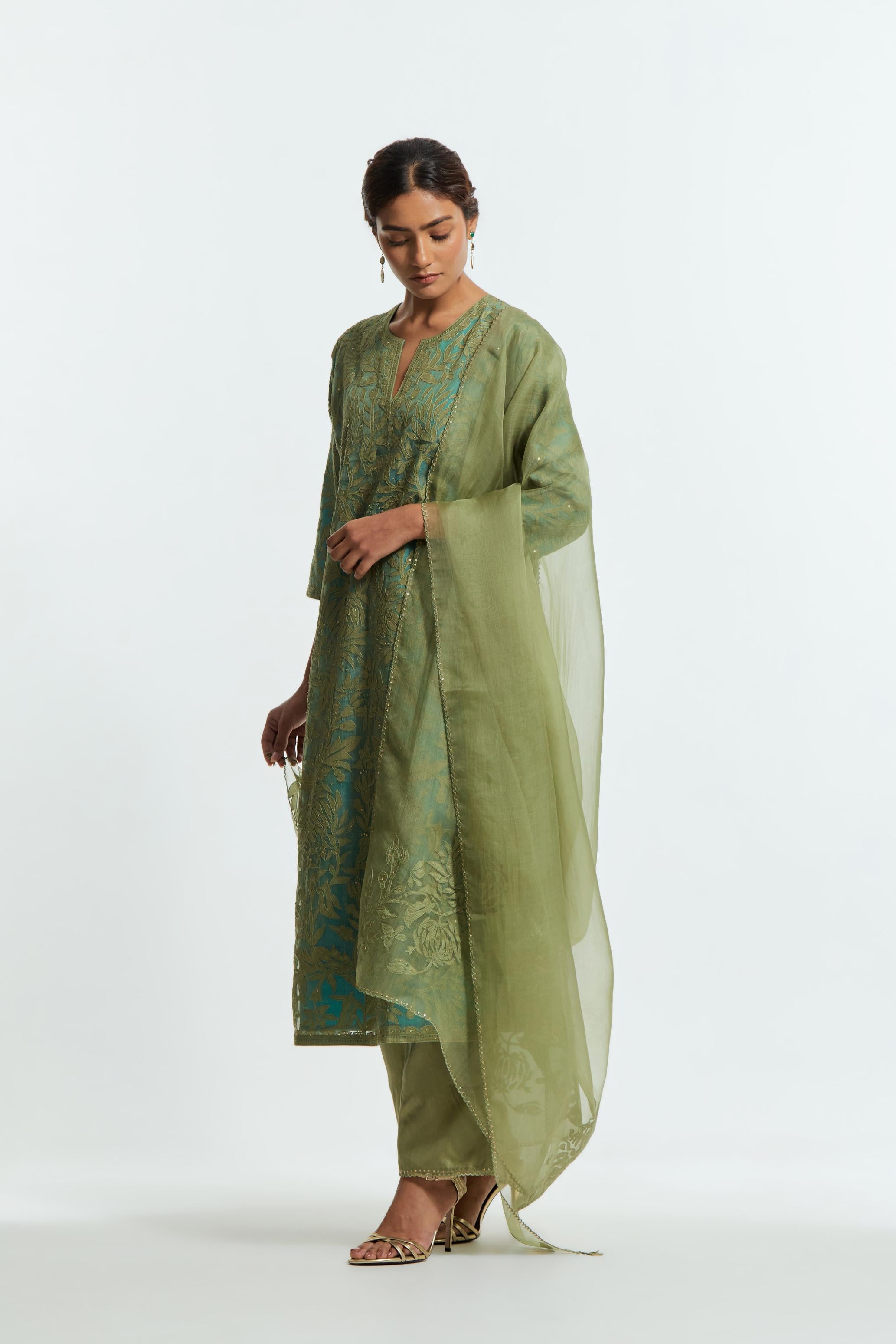 Green silk organza dupatta adorned with appliqué chrysanthemum floral motifs along all four borders, delicately highlighted with subtle sequins.