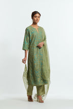 Green silk organza straight kurta set featuring an all-over silk appliqué trellis jaal, delicately highlighted with subtle sequins.