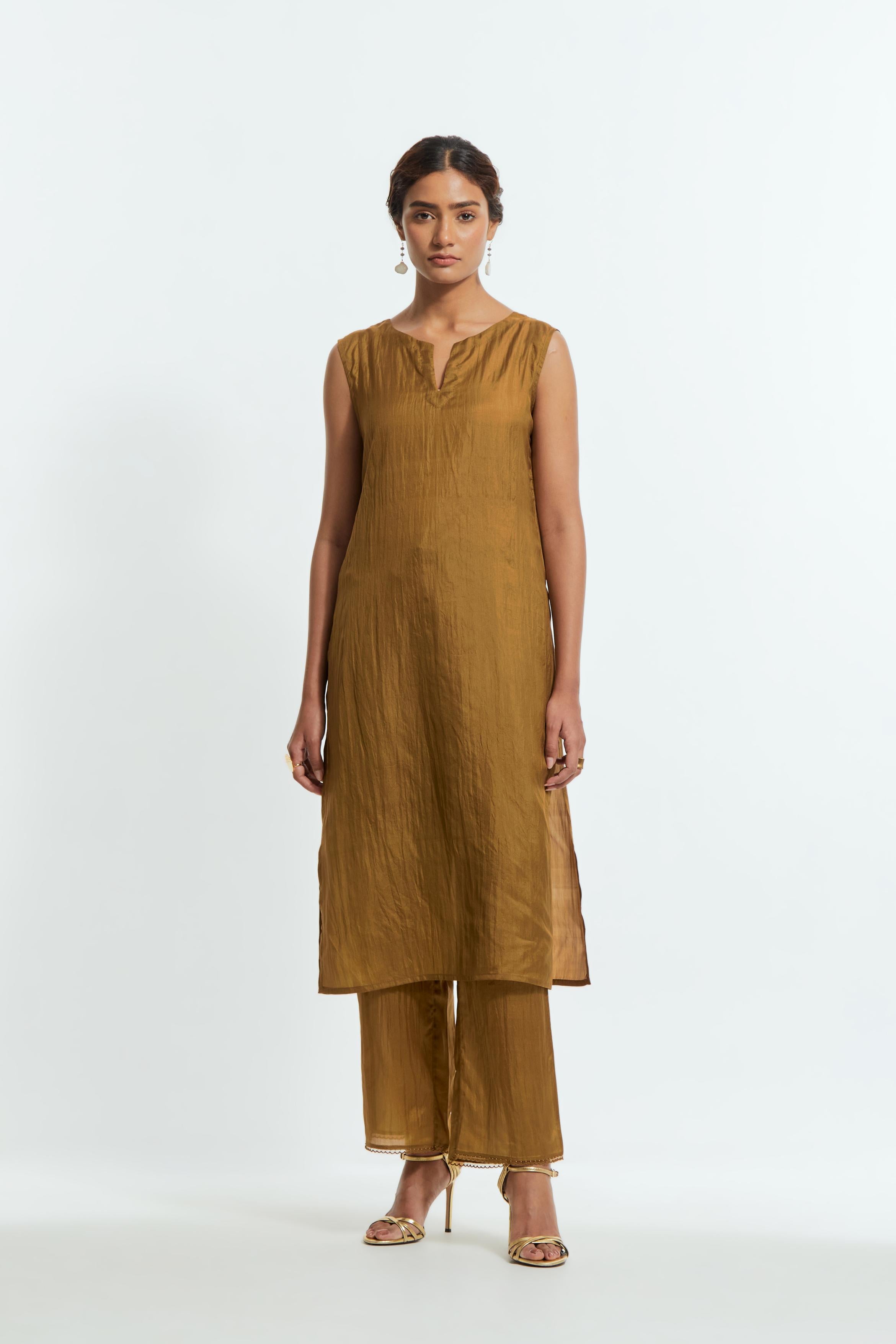 Olive silk organza straight kurta set featuring an all-over silk appliqué trellis jaal, delicately highlighted with aari thread work.