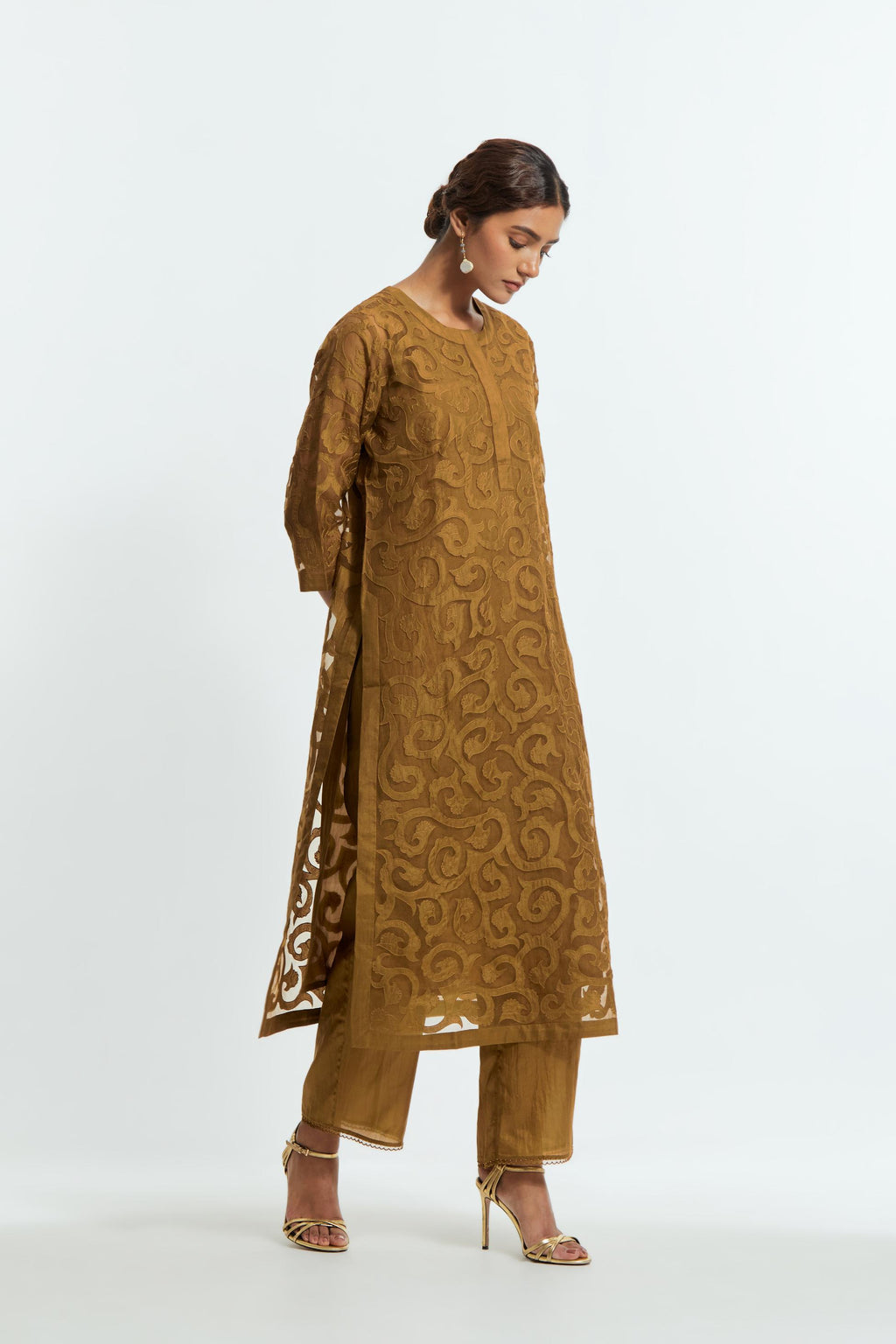Olive silk organza straight kurta set featuring an all-over silk appliqué trellis jaal, delicately highlighted with aari thread work.