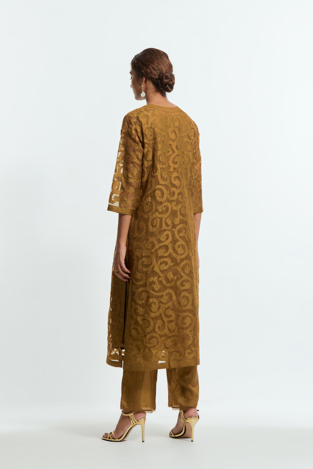 Olive silk organza straight kurta set featuring an all-over silk appliqué trellis jaal, delicately highlighted with aari thread work.