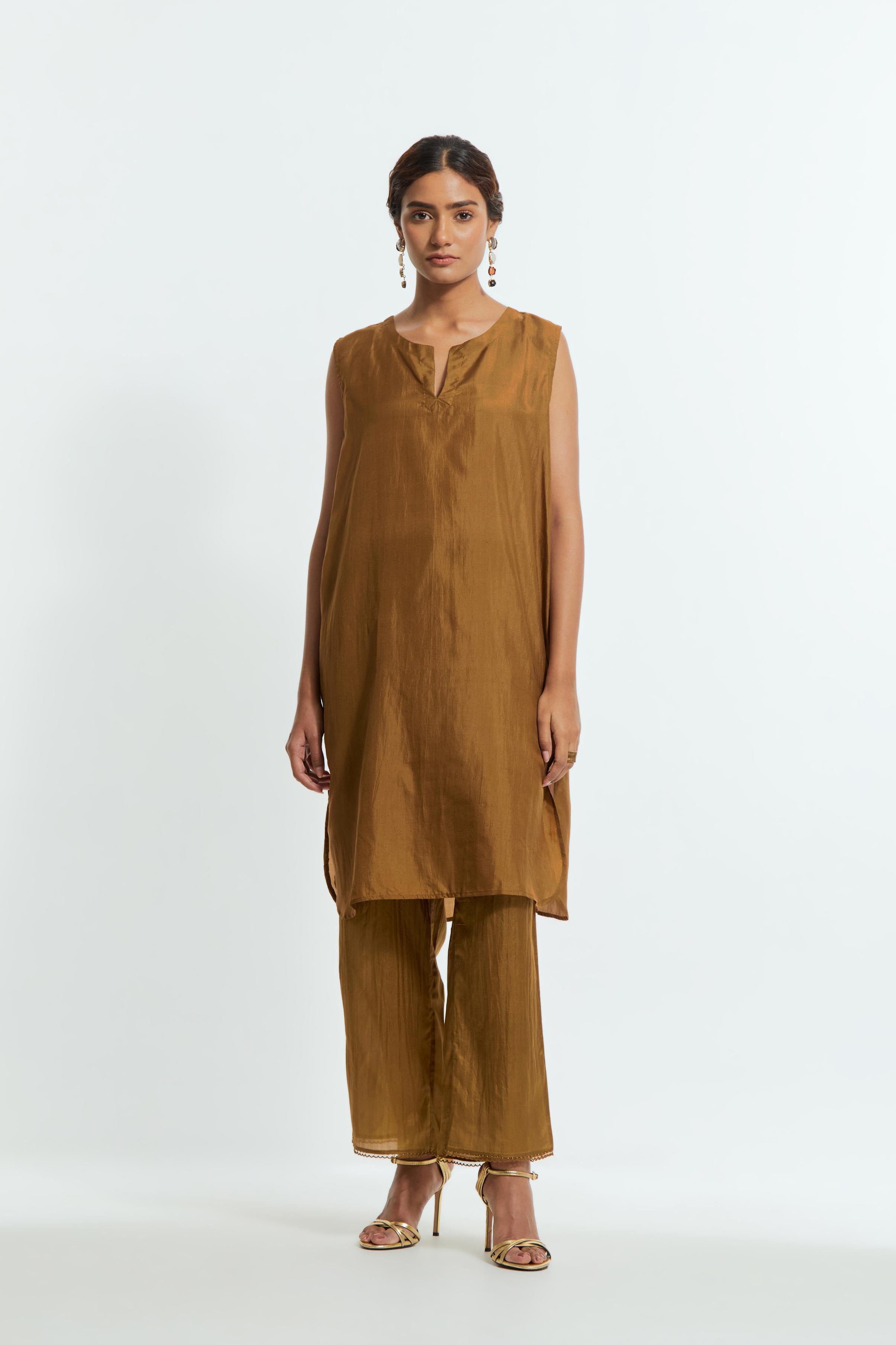 Olive silk organza easy-fit short kurta set adorned with an all-over silk appliqué trellis jaal, delicately highlighted with aari thread embroidery.