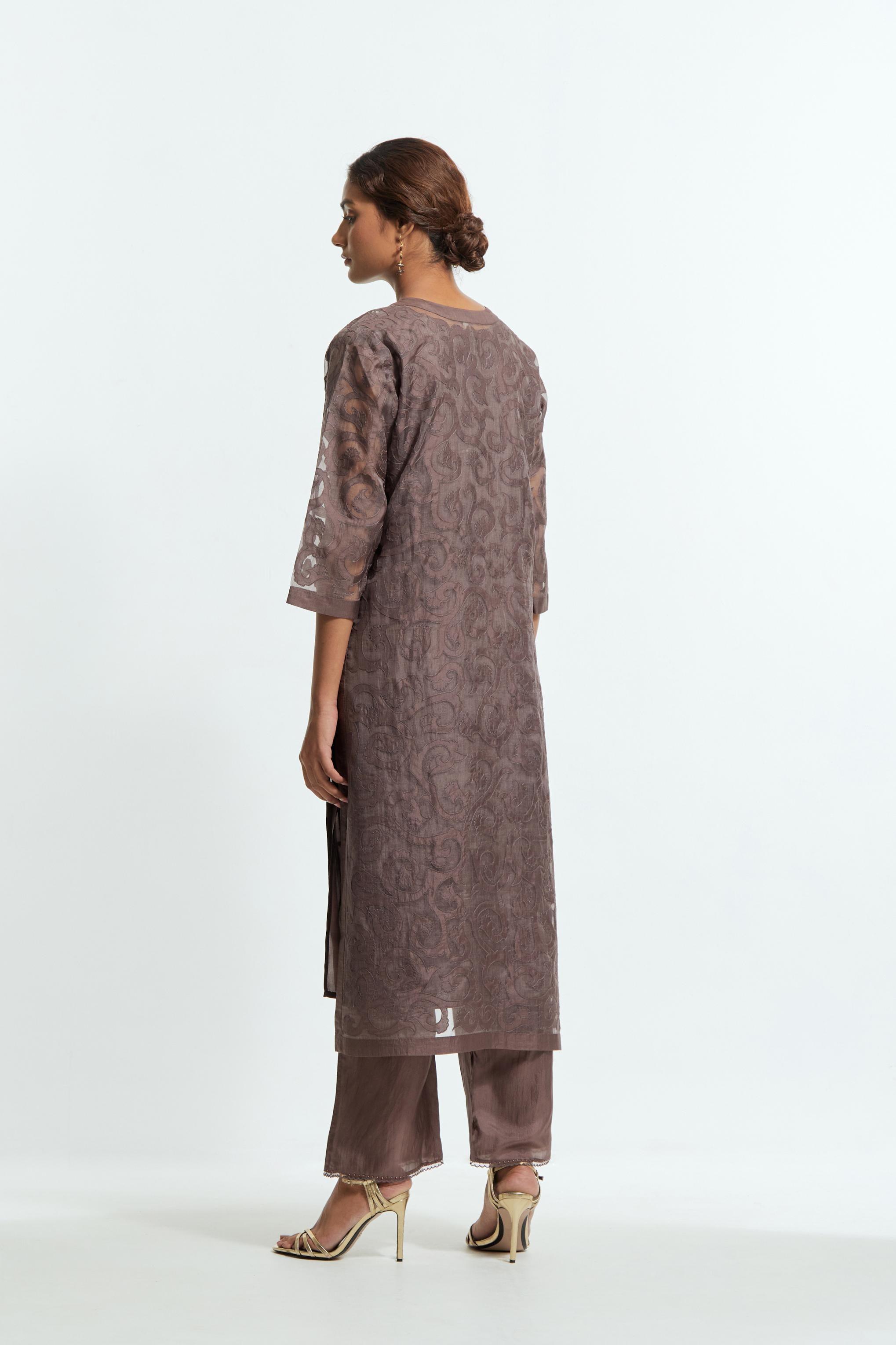 Grey silk organza straight kurta set featuring an all-over silk appliqué trellis jaal, delicately highlighted with aari threadwork.