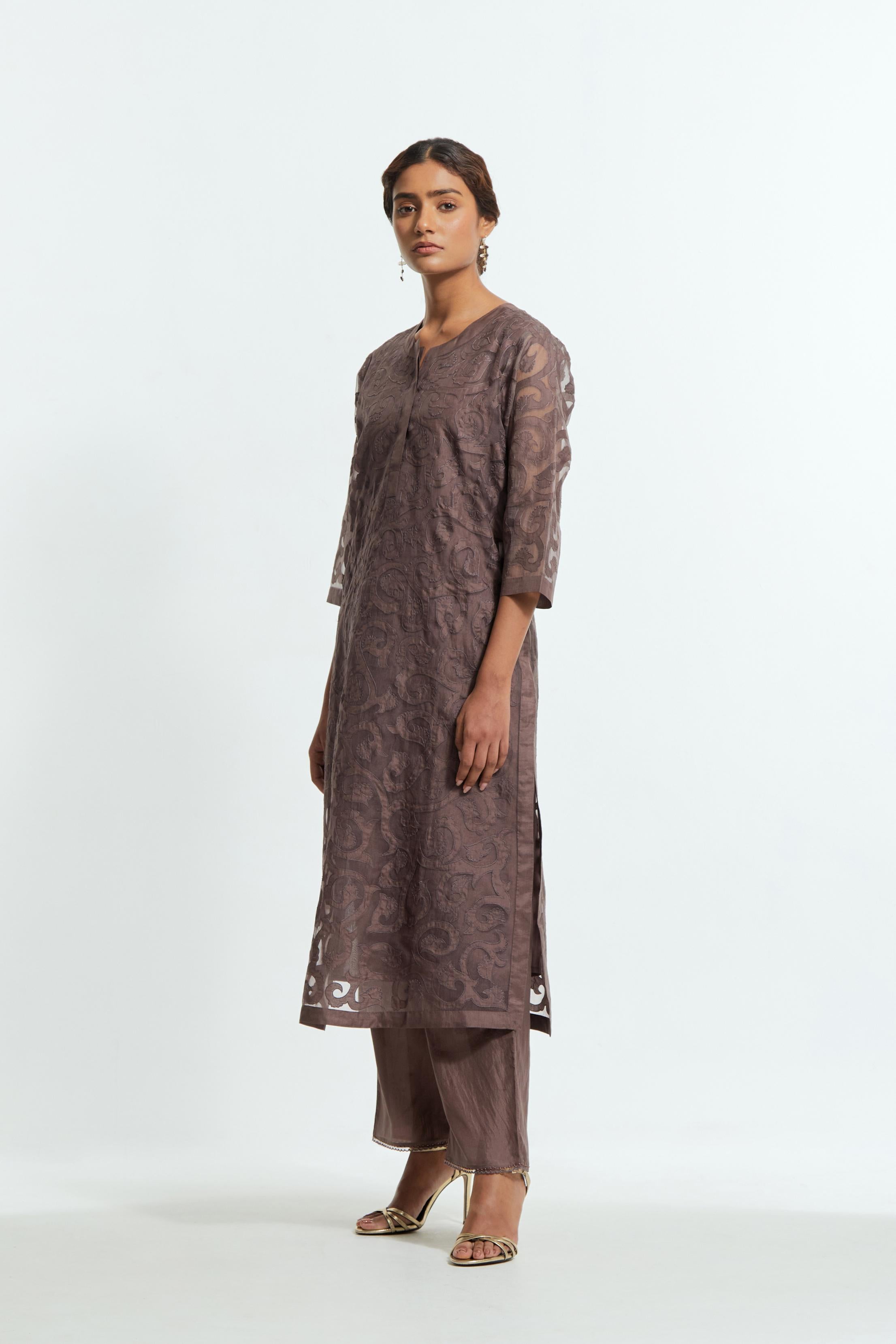 Grey silk organza straight kurta set featuring an all-over silk appliqué trellis jaal, delicately highlighted with aari threadwork.