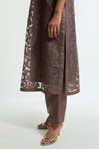 Grey silk organza straight kurta set featuring an all-over silk appliqué trellis jaal, delicately highlighted with aari threadwork.