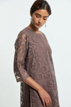 Grey silk organza straight kurta set featuring an all-over silk appliqué trellis jaal, delicately highlighted with aari threadwork.