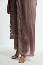 Grey silk organza straight kurta set featuring an all-over silk appliqué trellis jaal, delicately highlighted with aari threadwork.