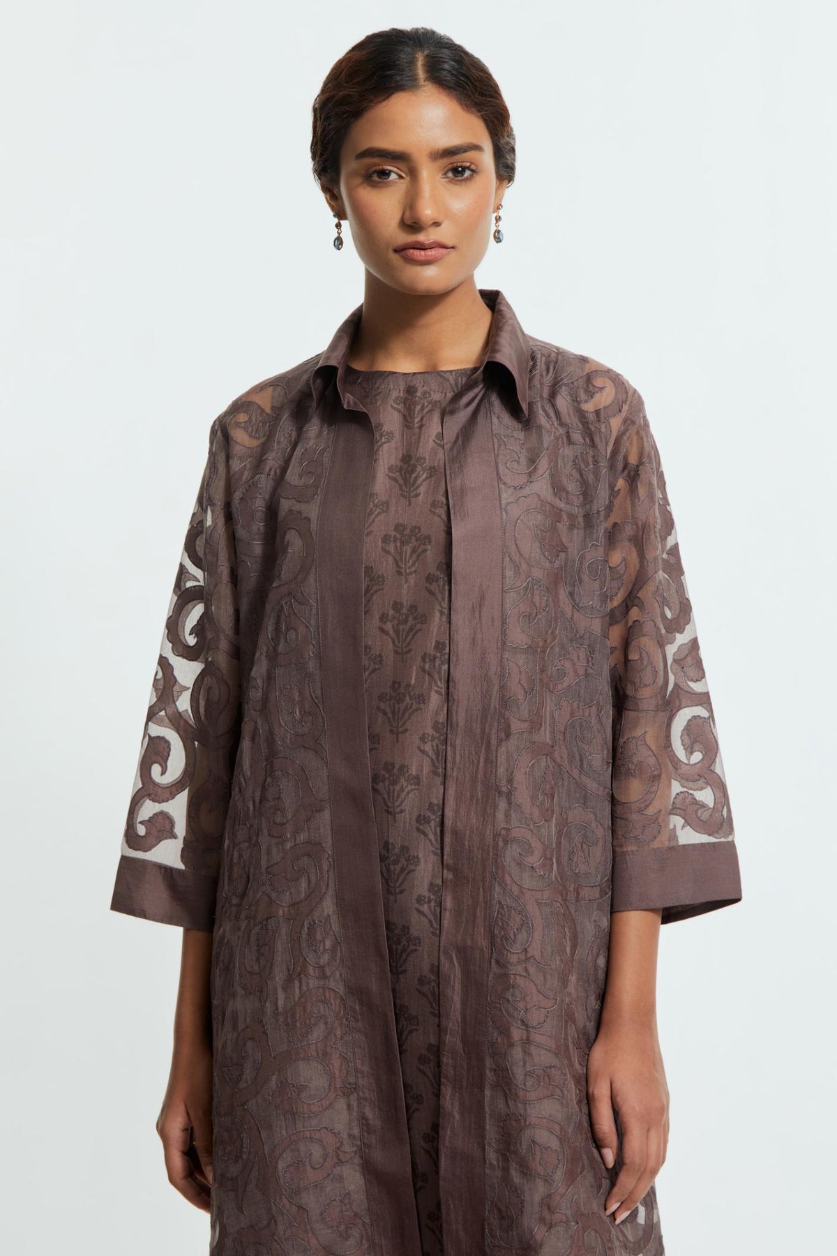 Grey Sheer overlay set in silk organza with a shirt collar, highlighted with all-over silk appliqué trellis jaal.