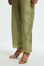Green silk straight pants detailed with scalloped organza edging at the hem, delicately highlighted with tonal beadwork.