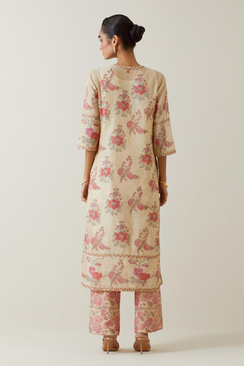 Beige tissue chanderi hand block printed straight kurta set, highlighted with embroidery.