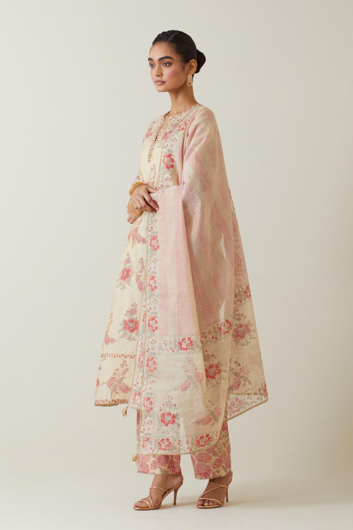 Beige tissue chanderi hand block printed dupatta.