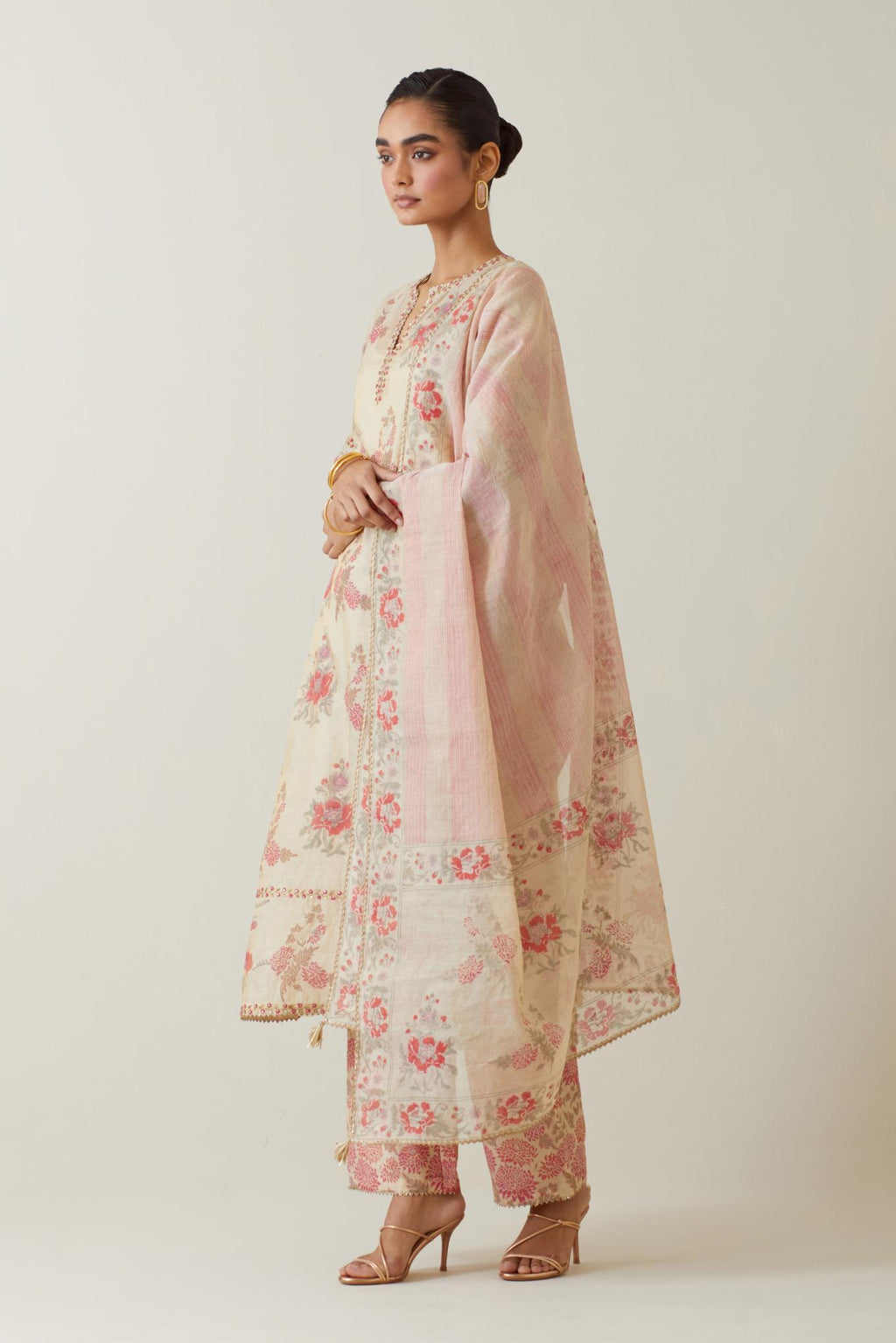 Beige tissue chanderi hand block printed straight kurta set, highlighted with embroidery.