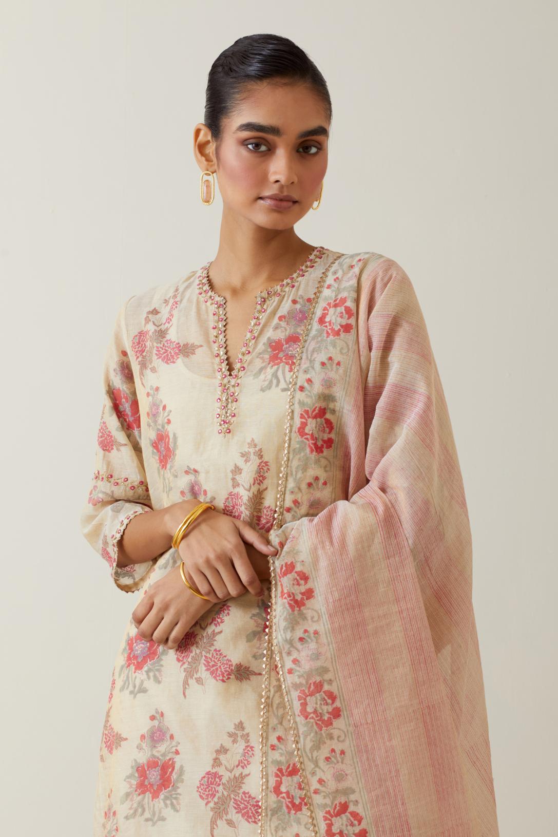 Beige tissue chanderi hand block printed dupatta.