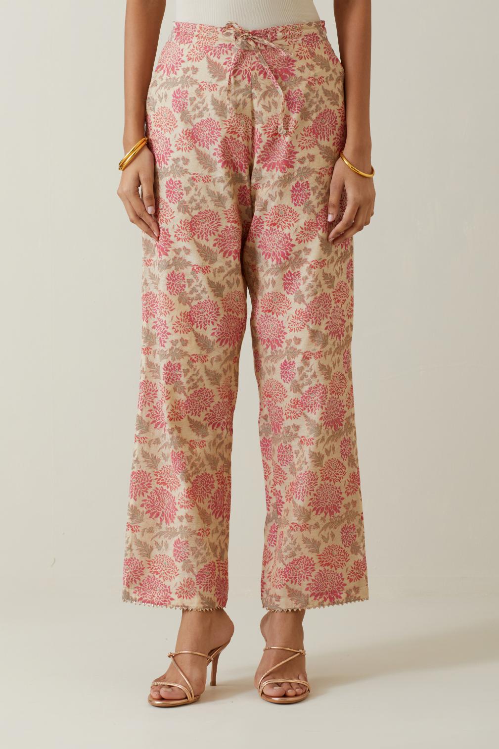 Beige tissue chanderi all-over floral hand block printed straight pants.