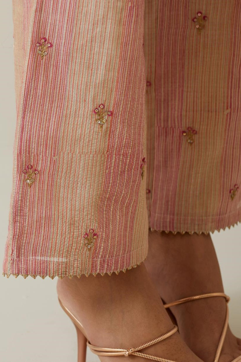 Beige tissue chanderi striped hand block printed straight pants with embroidery at bottom hem.