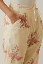 Beige tissue chanderi straight pants with all-over floral hand block printed boota.