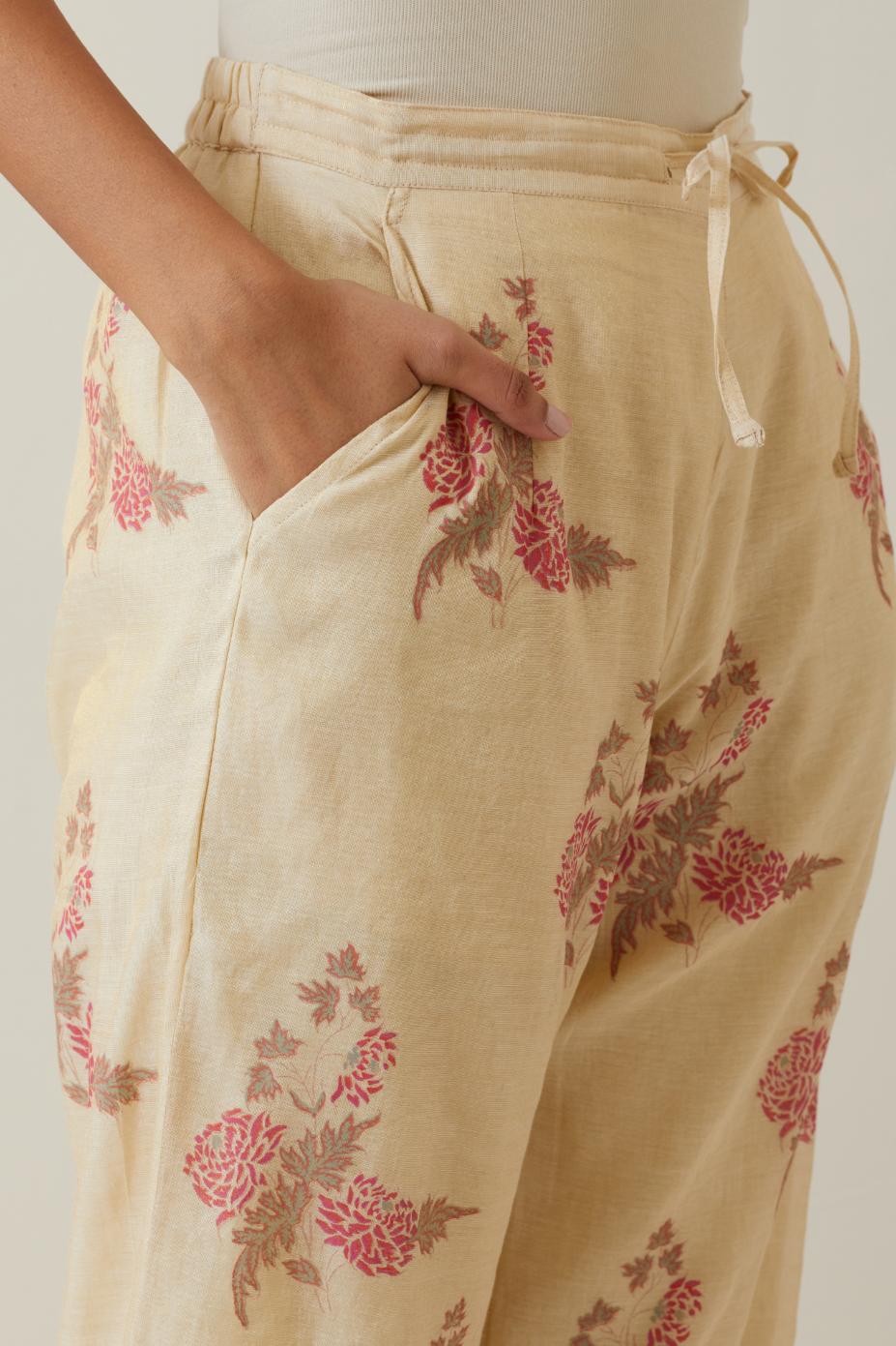 Beige tissue chanderi straight pants with all-over floral hand block printed boota.