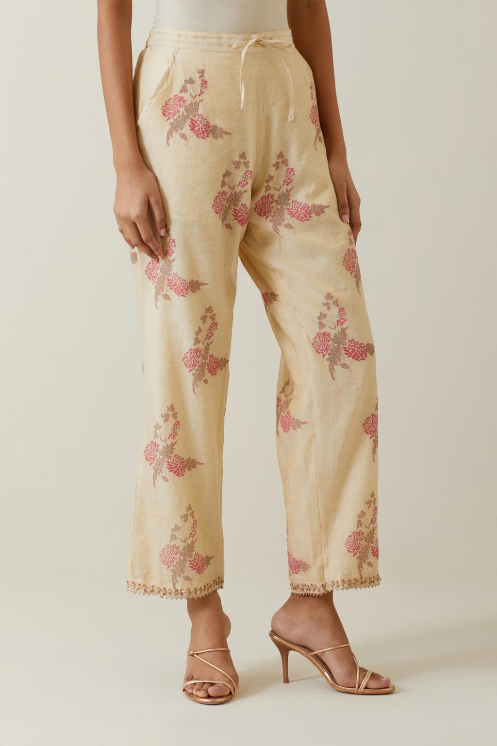 Beige tissue chanderi straight pants with all-over floral hand block printed boota.