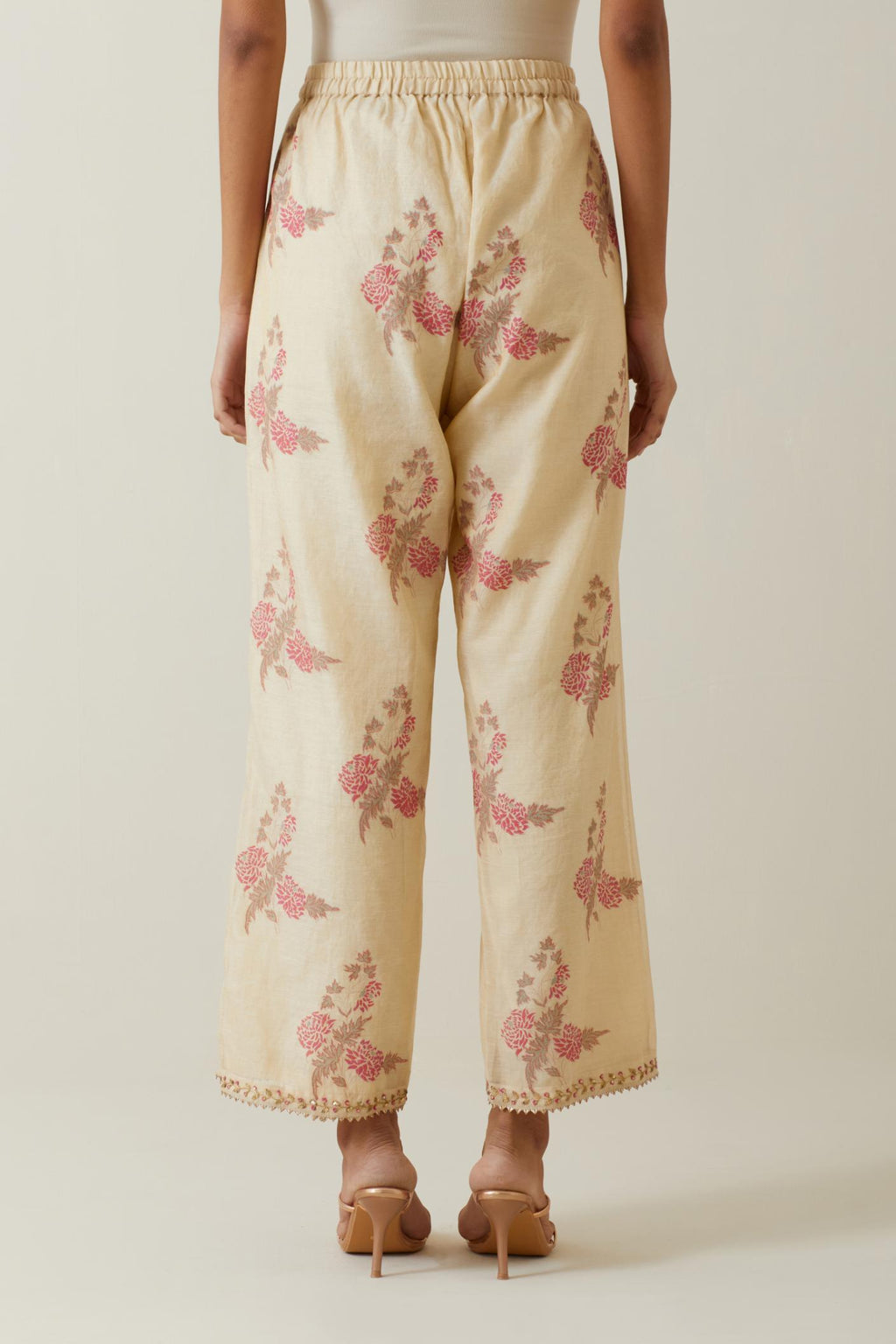 Beige tissue chanderi straight pants with all-over floral hand block printed boota.