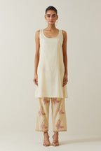 Beige tissue chanderi hand block printed A-line short kurta set.