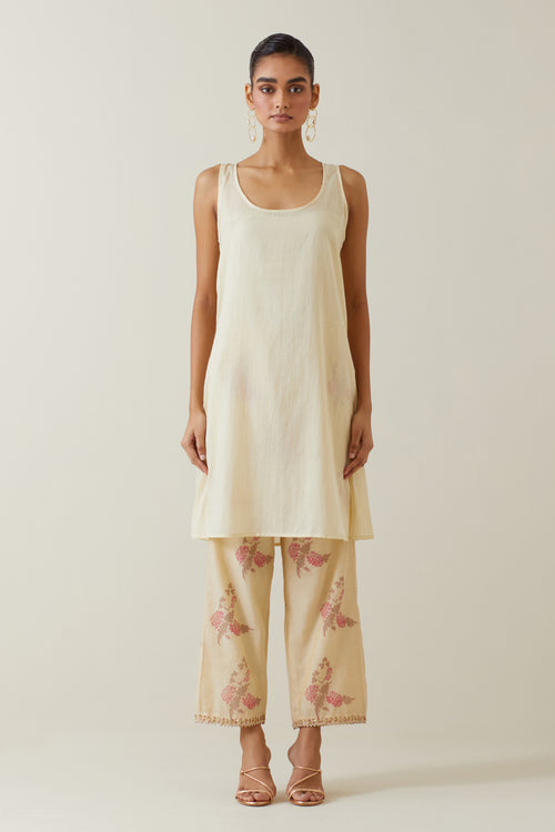 Beige tissue chanderi hand block printed A-line short kurta set.
