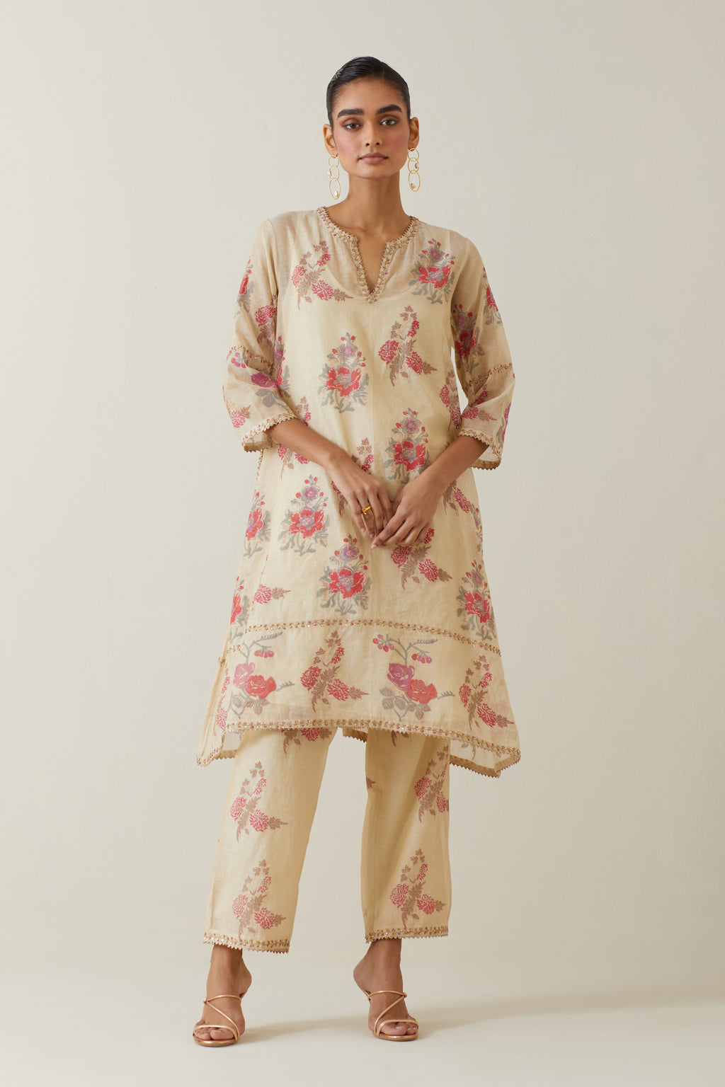 Beige tissue chanderi hand block printed A-line short kurta set.