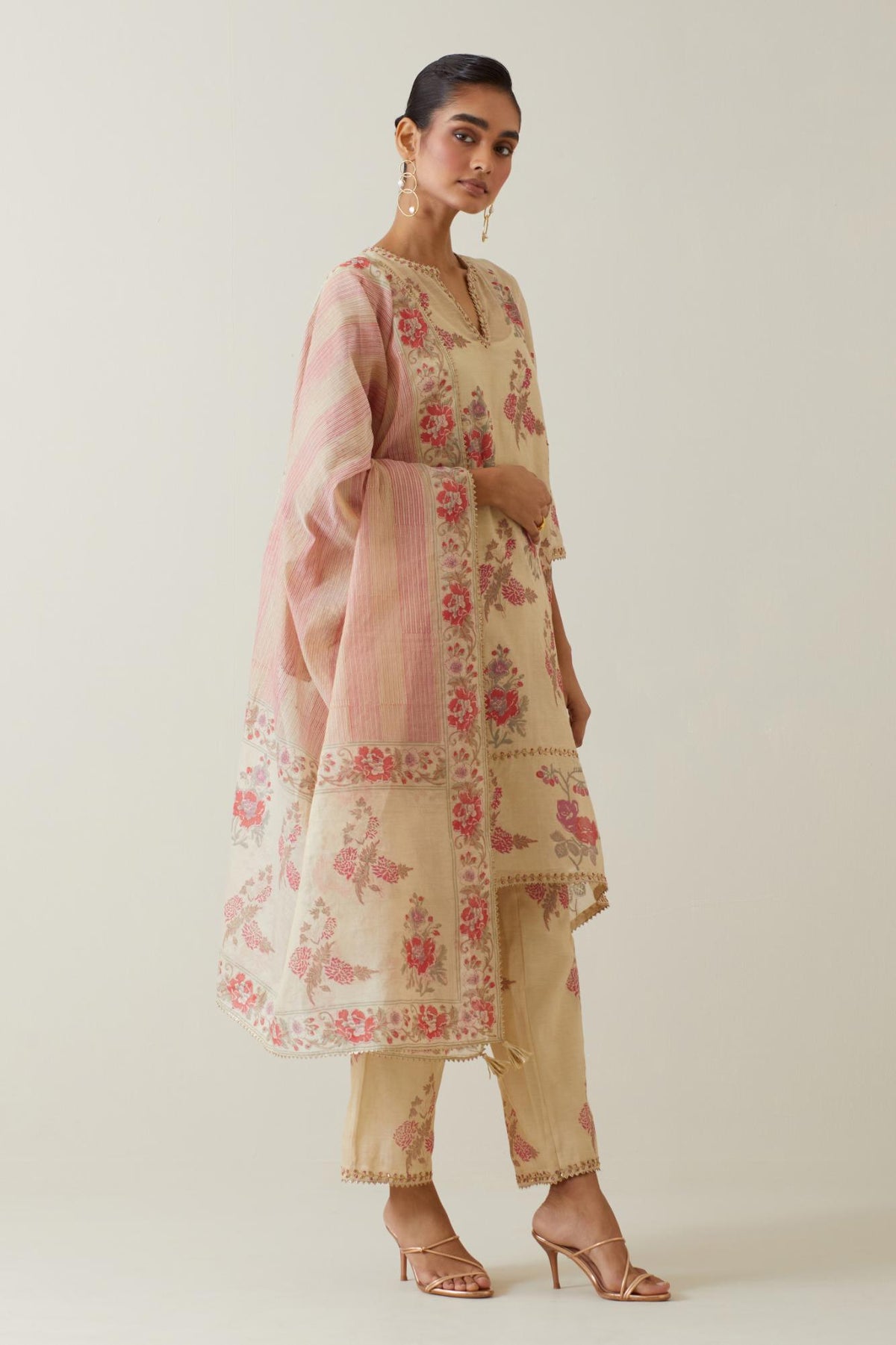 Beige tissue chanderi hand block printed dupatta.